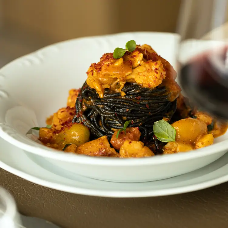 A dish of black spaghetti with seafood sauce at Osteria Giulia, one of the most romantic restaurntns in Toronto