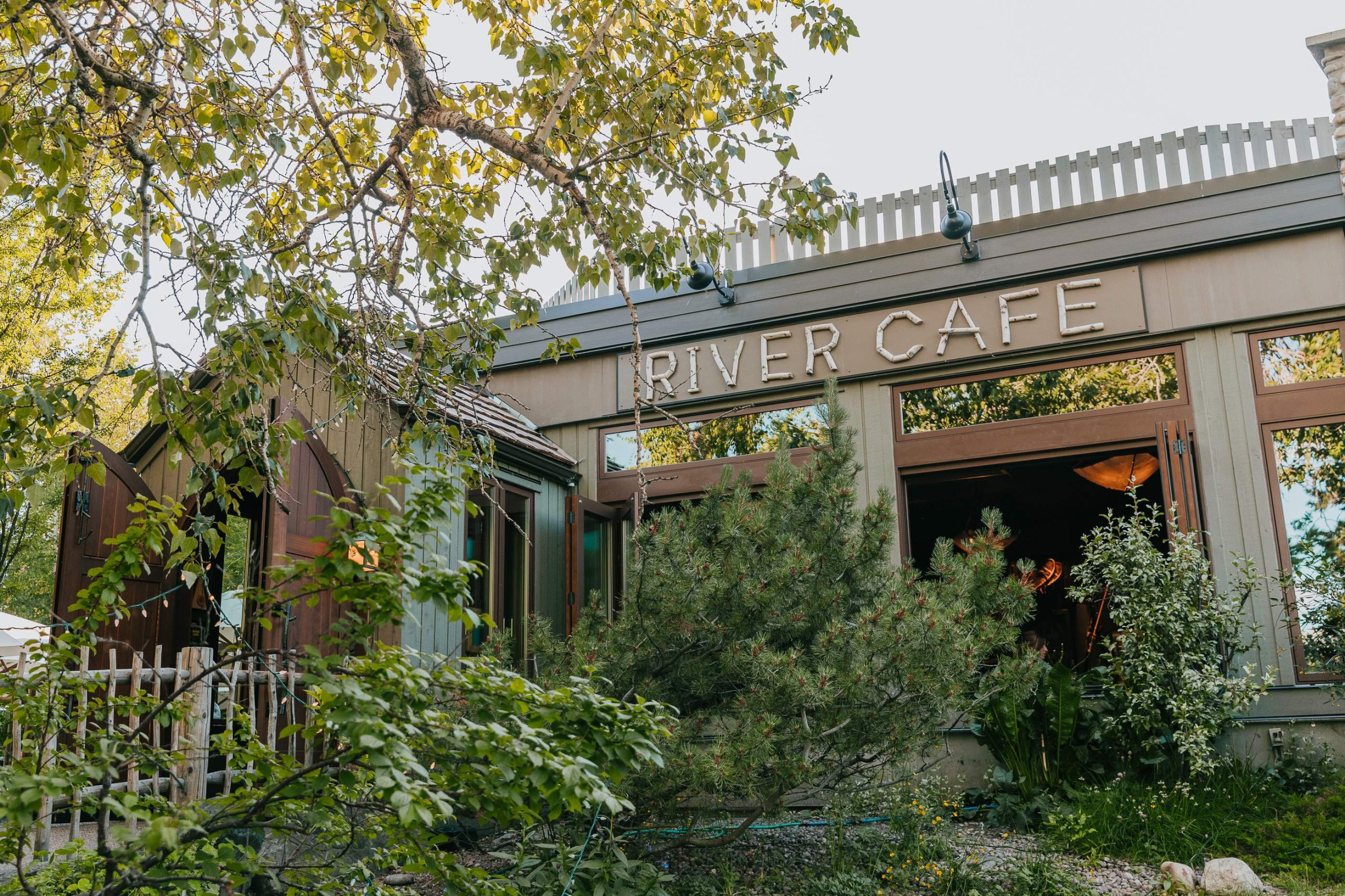 The entrance of River Café, a farm-to-table, eco-friendly restaurant championing sustainability in Calgary.