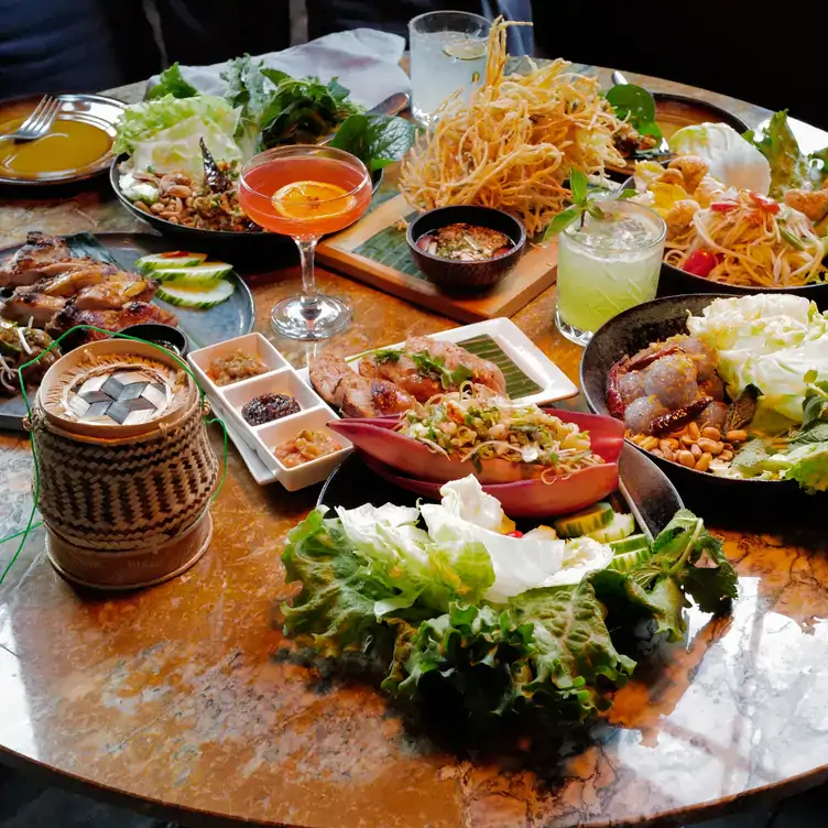 A spread of Asian dishes at Lao Lao Bar, one of the best patio restaurants in Toronto