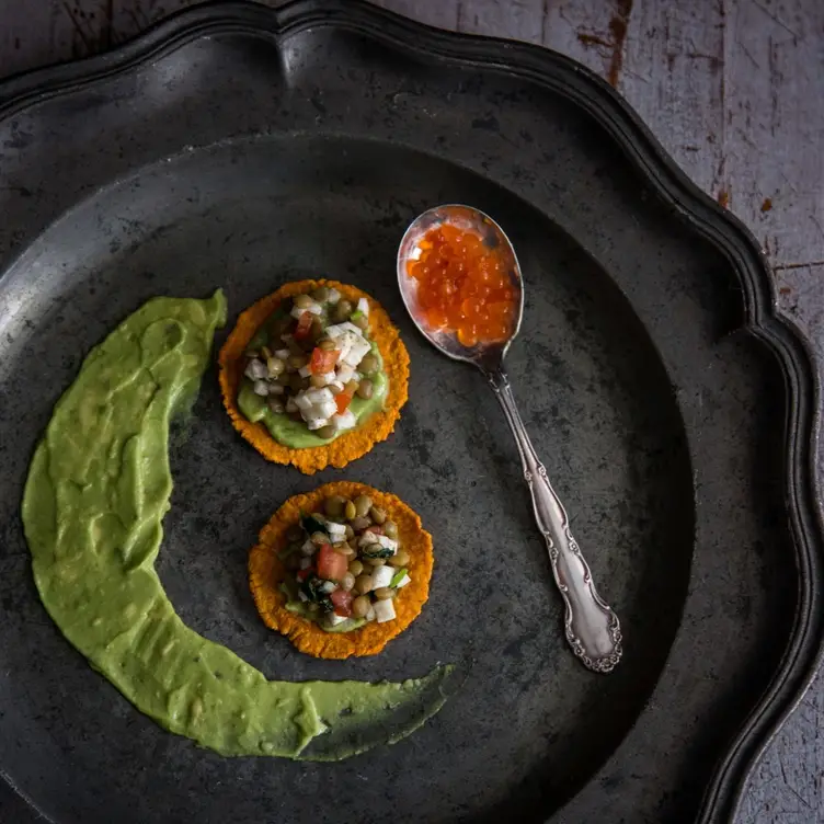 Guacamole with corn tostadas from La Bartola, one of the best vegan restaurants in Toronto.