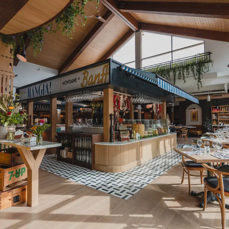 View of the open and inviting indoor bar at LUPO Italian Ristorante and Patio, the best authentic Italian coastal cuisine near Calgary.