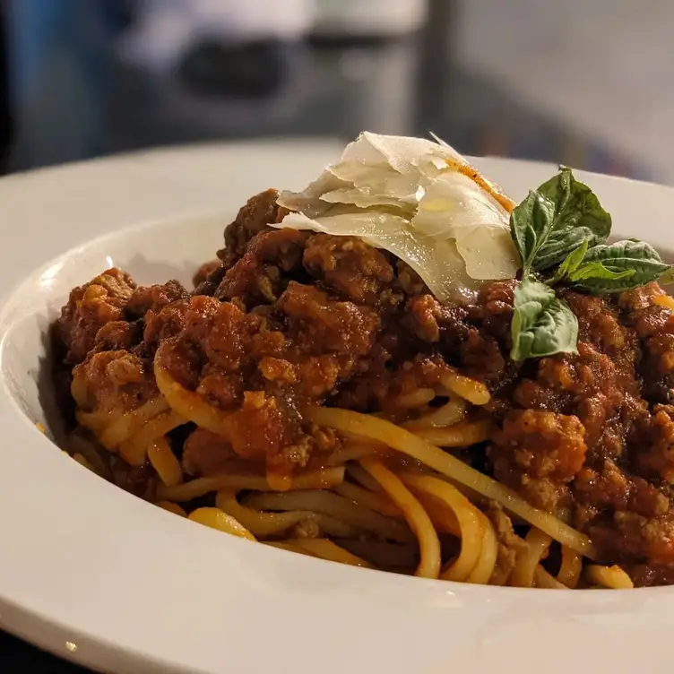 Spaghetti in a Bolognese sauce with ground beef and pork in tomato sauce at Vivoli, Little Italy.