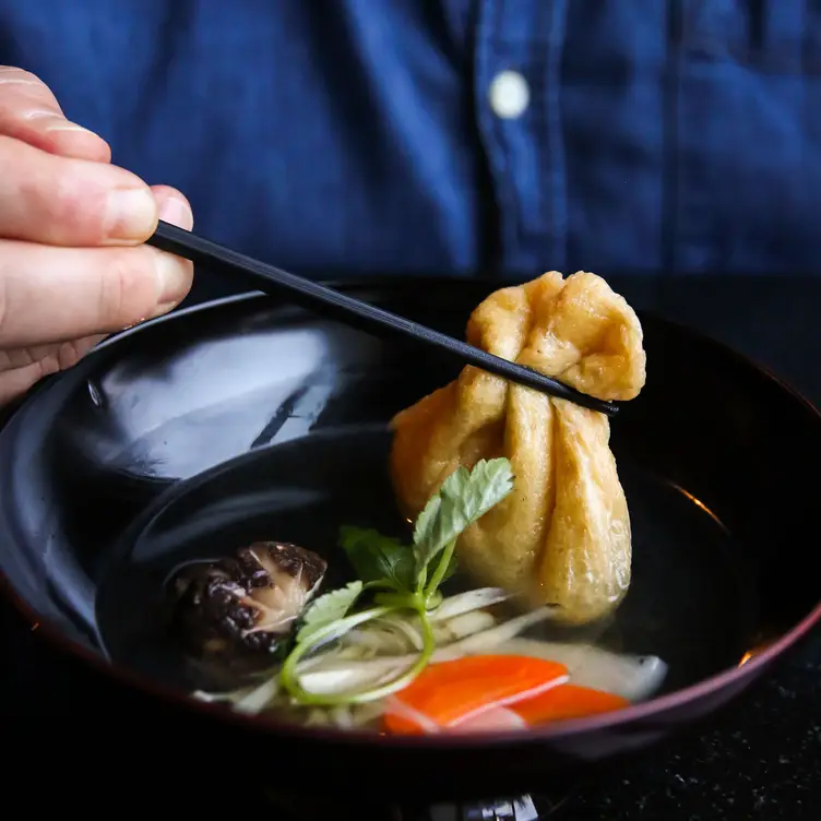 The seating arrangement at one of Vancouver’s best Japanese restaurants is designed for an immersive, social night out.