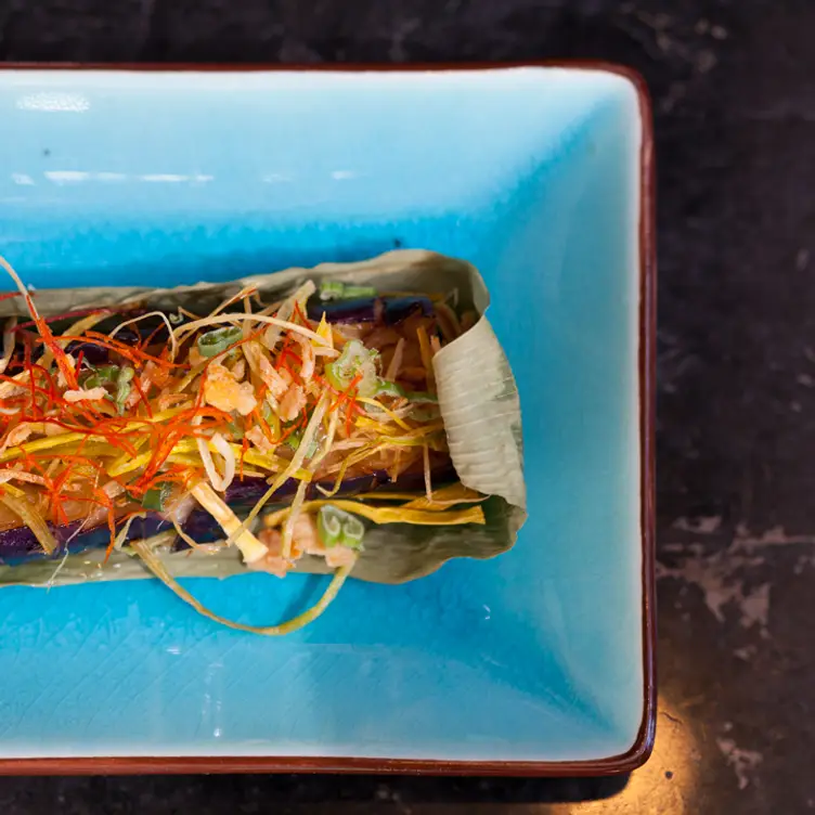 Shredded vegetables on a leaf at Ki Modern Japanese + Bar.