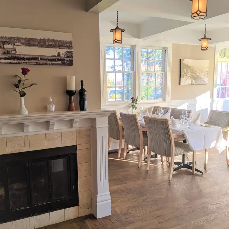 The open and naturally lit dining room area creates a really inviting atmosphere at one of the best French restaurants in Vancouver.