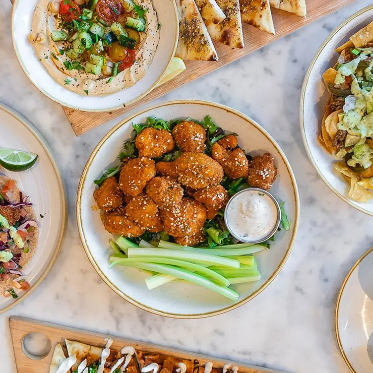 Fried buffalo cauliflower with hemp hearts at Fresh Kitchen + Juice Bar.