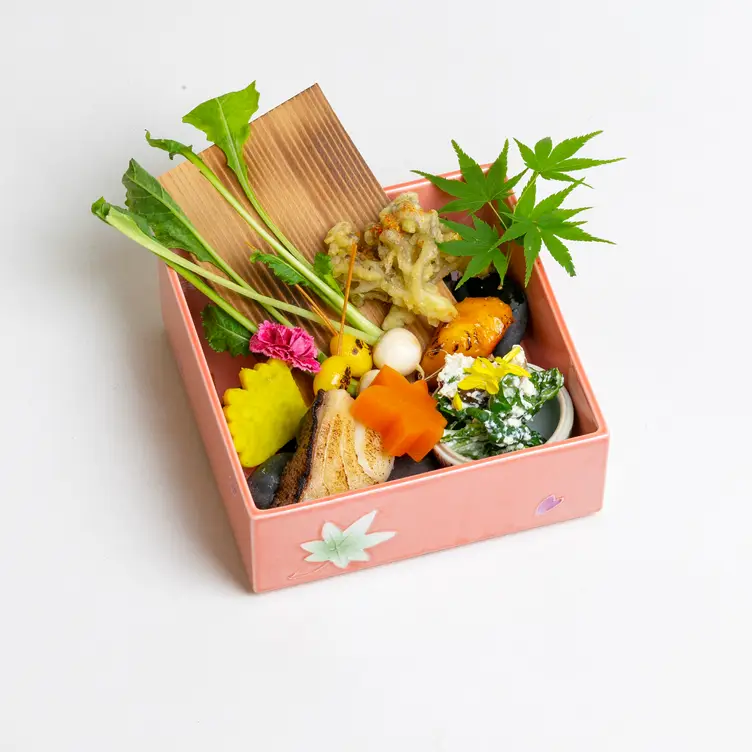 Seasonal vegetables in a lunch box set at Miku Restaurant, one of the best restaurants in Toronto for Japanese cuisine.