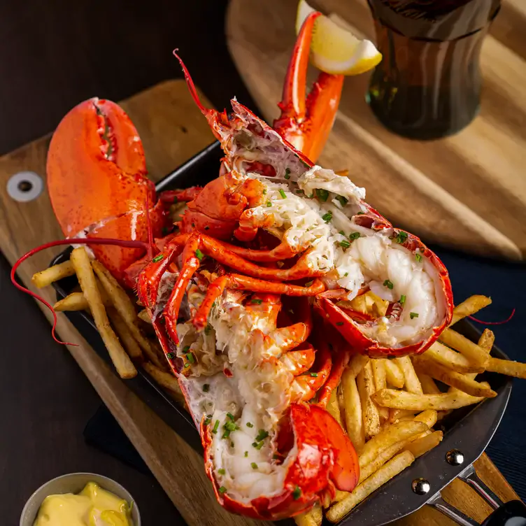 Crack open some fresh East Coast lobster over a bed of fries at one of Toronto’s best seafood restaurants.