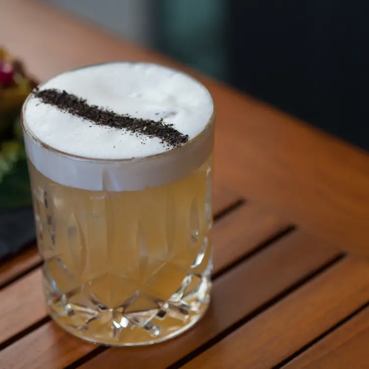 A cream-colored cocktail at Ki Modern Japanese + Bar, some of the best Japanese cuisine in Toronto.