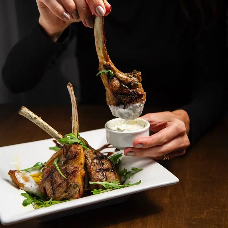 Lamb chops and tzatziki combine at Meza Resto Bar, which might be the best Greek restaurant in Toronto’s Etobicoke area.