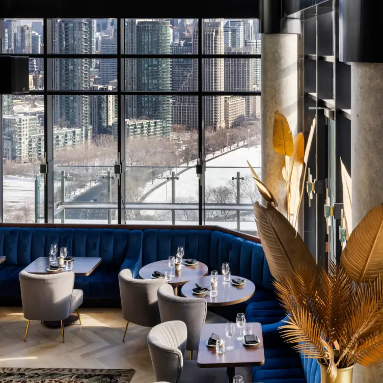 The dining room sits high above the city at Valerie.