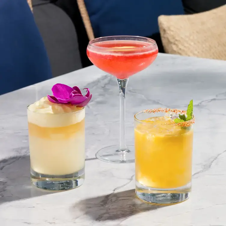 The bright and colourful cocktails at Beach House pair perfectly with any of the menu items. Credit: Beach House