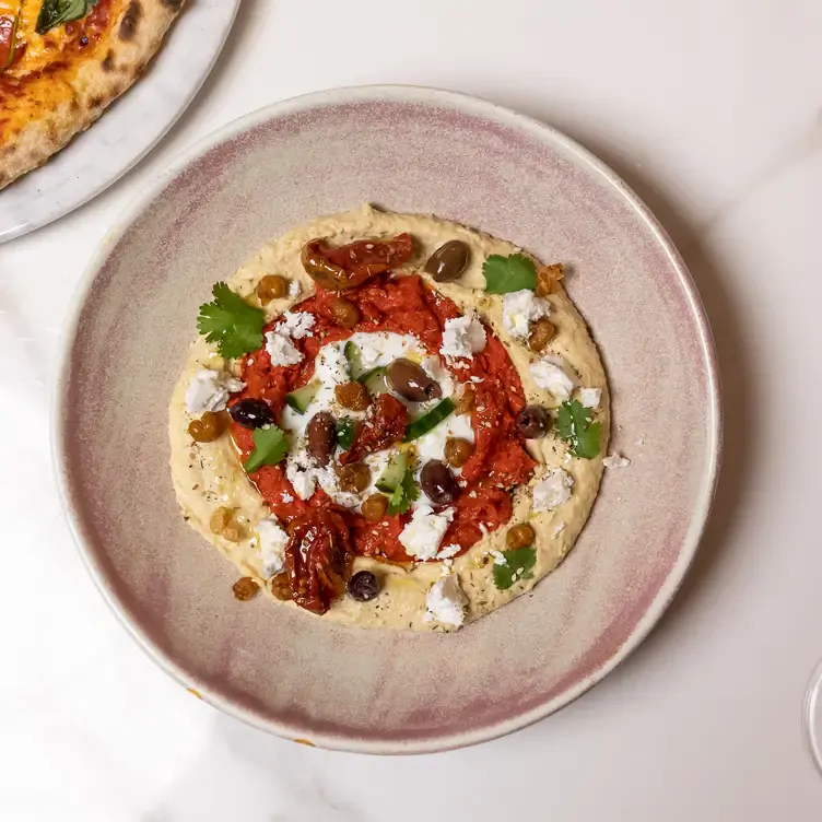 Hummus with feta and olives at Taps Public House, possibly the best Valentine’s restaurant Toronto offers.