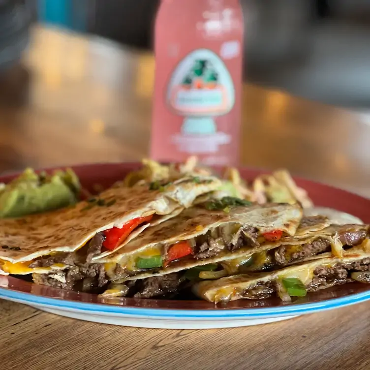 Beef quesadilla with melted cheese at Taco N Tequila, one of the best Mexican restaurants near Toronto.