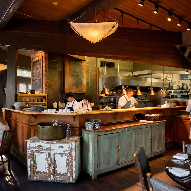 The open kitchen area at River Café, one of the best romantic restaurants in Calgary.