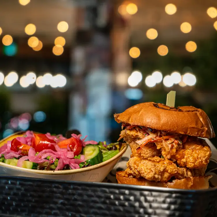 Buttermilk fried chicken on a brioche bun at The Banquet, one of the best family restaurants in Calgary.