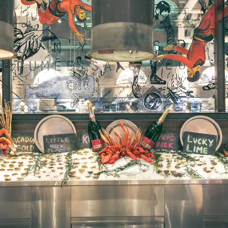 A seafood bar with shelled delicacies on ice at Cluny, likely the best French restaurant in Toronto.