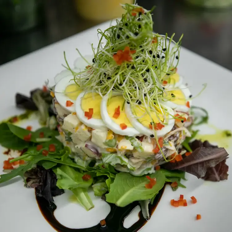 A salad with sprouts and eggs at West Plains Bistro, one of the best French restaurants Toronto 2022.