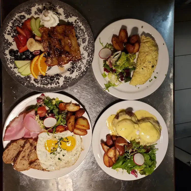 A selection of brunch plates, including eggs benedict, at Le Baratin, one of the best French restaurants in Toronto.