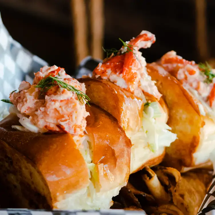 East Coast lobster in freshly baked bread at Blowers & Grafton, one of the best places for brunch in Calgary.