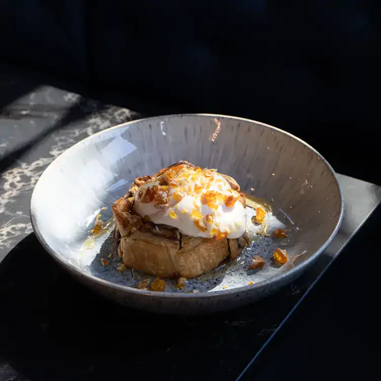 Stuffed French toast with whipped cream at Irene, one of the best Harbourfront restaurants Toronto offers.