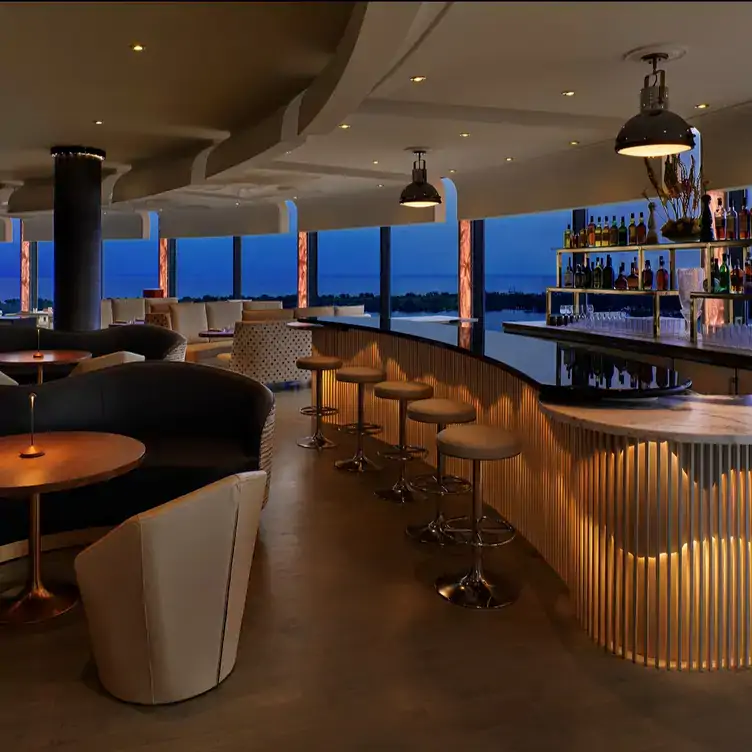 Spacious booth seating overlooking the harbour at Don Alfonso 1890, one of the best waterfront restaurants in Toronto.