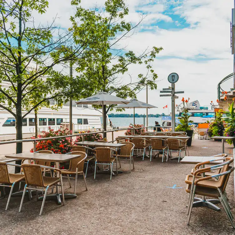 Spacious lakeside patio seating at The Goodman Pub and Kitchen, one of the best waterfront restaurants in Toronto.