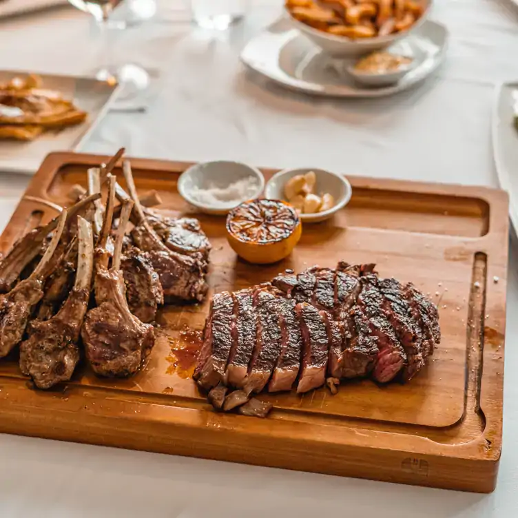 A board of sliced steak at Towne 380 Steakhouse.