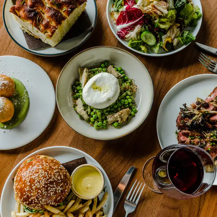 A spread of dishes at Gusto 501 in Toronto